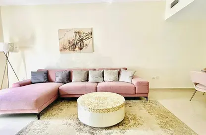 Living Room image for: Apartment - 2 Bedrooms - 3 Bathrooms for sale in May Residence - Jumeirah Village Circle - Dubai, Image 1
