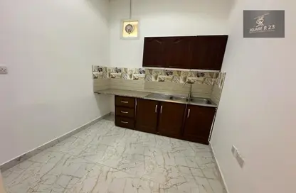 Kitchen image for: Apartment - 1 Bedroom - 1 Bathroom for rent in Khalifa City - Abu Dhabi, Image 1