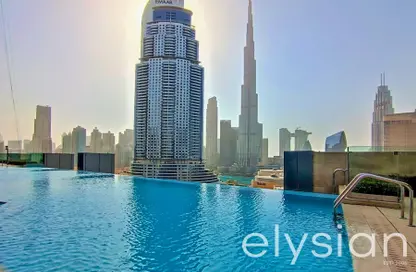 Pool image for: Apartment - 1 Bedroom - 2 Bathrooms for sale in Boulevard Point - Downtown Dubai - Dubai, Image 1