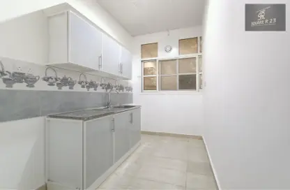 Kitchen image for: Apartment - 1 Bathroom for rent in Khalifa City - Abu Dhabi, Image 1