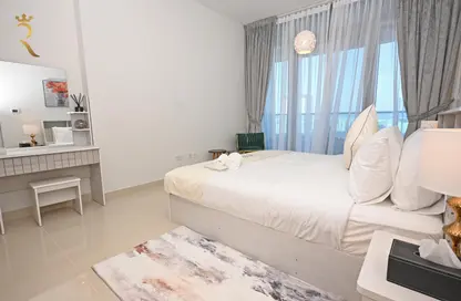 Room / Bedroom image for: Apartment - 1 Bedroom - 2 Bathrooms for rent in Julphar Residence - Al Reem Island - Abu Dhabi, Image 1