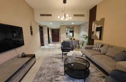 Living Room image for: Apartment - 1 Bedroom - 2 Bathrooms for sale in Etlala Residence - Dubai Residence Complex - Dubai, Image 1