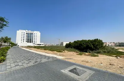 Land - Studio for sale in Queue Point - Liwan - Dubai Land - Dubai