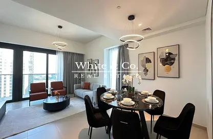 Living / Dining Room image for: Apartment - 3 Bedrooms - 4 Bathrooms for rent in Act Towers - Opera District - Downtown Dubai - Dubai, Image 1