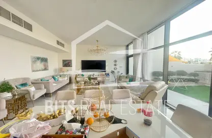 Living / Dining Room image for: Villa - 5 Bedrooms - 5 Bathrooms for sale in Trixis - The Roots DAMAC Hills 2 - Damac Hills 2 - Dubai, Image 1