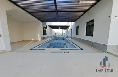 Pool image for: Villa - 5 Bedrooms - 5 Bathrooms for rent in Jumeirah 1 - Jumeirah - Dubai, Image 1
