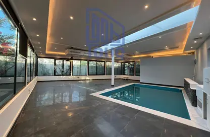 Pool image for: Villa - 5 Bedrooms - 7 Bathrooms for sale in Contemporary Style - Al Reef Villas - Al Reef - Abu Dhabi, Image 1