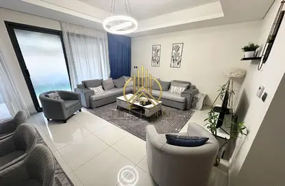 Living Room image for: Townhouse - 3 Bedrooms - 5 Bathrooms for sale in Aurum Villas - Sycamore - Damac Hills 2 - Dubai, Image 1