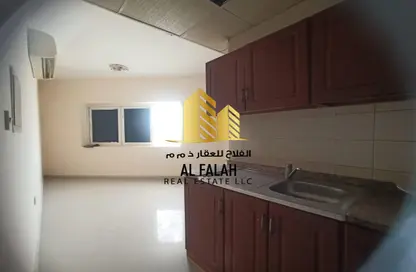 Kitchen image for: Apartment - 1 Bathroom for rent in Al Butina - Sharjah, Image 1