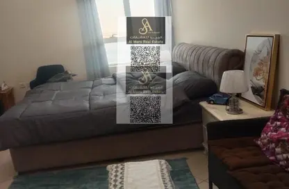 شقة - غرفة نوم - 2 حمامات للبيع في أورينت تاور 1 - أورينت تاور - البستان - عجمان