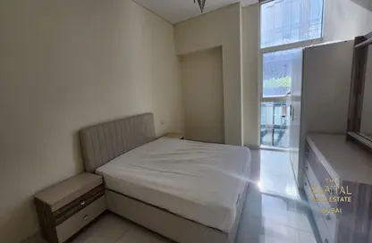صورة لـ غرفة- غرفة النوم شقة - غرفة نوم - 2 حمامات للايجار في بارك سنترال - الخليج التجاري - دبي ، صورة رقم 1