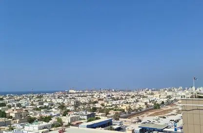 Apartment - 2 Bedrooms - 2 Bathrooms for rent in Al Ghanem Business Center - Al Majaz 3 - Al Majaz - Sharjah