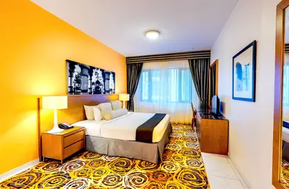 النزل و الشقق الفندقية - 2 غرف نوم - 2 حمامات للايجار في جولدن ساندز 10 للشقق الفندقية - منخول - بر دبي - دبي