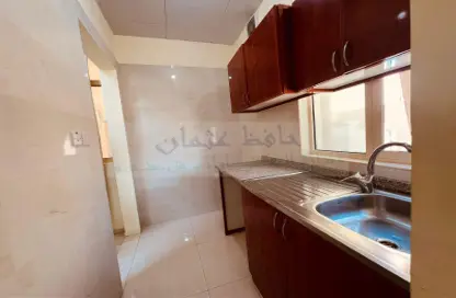 صورة لـ مطبخ شقة - غرفة نوم - 1 حمام للايجار في الروضة - أبوظبي ، صورة رقم 1