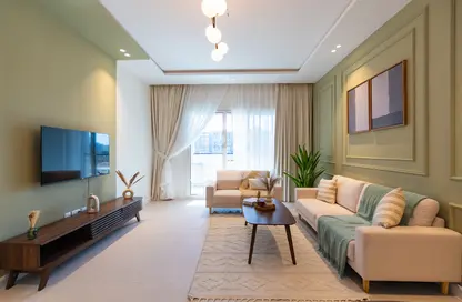 Living Room image for: Apartment - 1 Bedroom - 2 Bathrooms for sale in Burj View Residence - Arjan - Dubai, Image 1