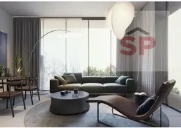 Living / Dining Room image for: Apartment - 2 Bedrooms - 3 Bathrooms for sale in The Gate - Aljada - Sharjah, Image 1