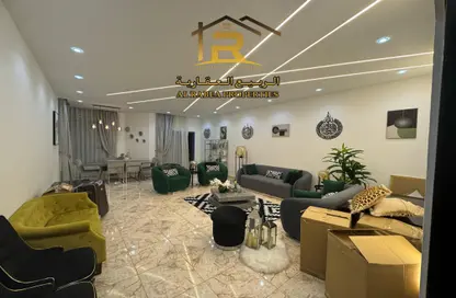 Living Room image for: Apartment - 3 Bedrooms - 4 Bathrooms for sale in Al Naemiya Towers - Al Nuaimiya - Ajman, Image 1