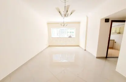 Empty Room image for: Apartment - 1 Bedroom - 1 Bathroom for rent in Bin Ham Towers - Al Taawun - Sharjah, Image 1