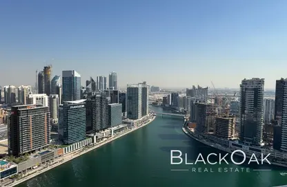 شقة - 2 غرف نوم - 2 حمامات للبيع في بنينسولا ثري - بنينسولا - الخليج التجاري - دبي