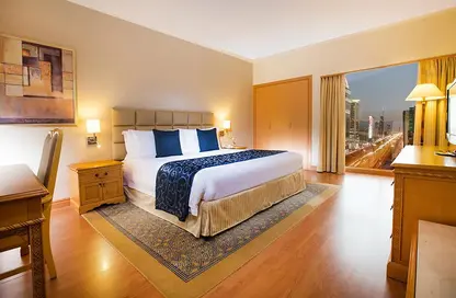 Room / Bedroom image for: Hotel  and  Hotel Apartment - 2 Bedrooms - 2 Bathrooms for rent in Millennium Plaza Hotel  and  Commercial Tower - Sheikh Zayed Road - Dubai, Image 1
