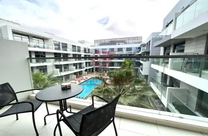 Balcony image for: Apartment - 1 Bedroom - 2 Bathrooms for rent in Prime Views by Prescott - Meydan Avenue - Meydan - Dubai, Image 1