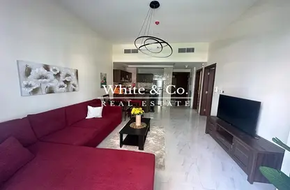 Living Room image for: Apartment - 1 Bedroom - 2 Bathrooms for rent in Sydney Tower - Jumeirah Village Circle - Dubai, Image 1