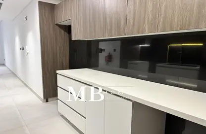 صورة لـ مطبخ شقة - 2 غرف نوم - 3 حمامات للبيع في مروة هايتس - قرية الجميرا سركل - دبي ، صورة رقم 1