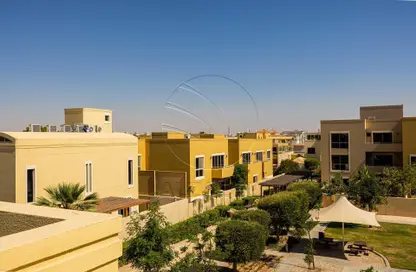 Outdoor Building image for: Townhouse - 3 Bedrooms - 4 Bathrooms for sale in Yasmin Community - Al Raha Gardens - Abu Dhabi, Image 1