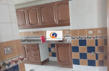Kitchen image for: Apartment - 3 Bedrooms - 3 Bathrooms for rent in Tourist Club Area - Abu Dhabi, Image 1