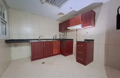 Kitchen image for: Apartment - 1 Bedroom - 1 Bathroom for rent in Street 64 - Al Nahda - Sharjah, Image 1