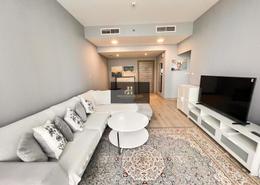 Living Room image for: Apartment - 1 bedroom - 1 bathroom for rent in Bloom Towers C - Bloom Towers - Jumeirah Village Circle - Dubai, Image 1