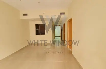Empty Room image for: Apartment - 1 Bedroom - 2 Bathrooms for sale in May Residence - Jumeirah Village Circle - Dubai, Image 1