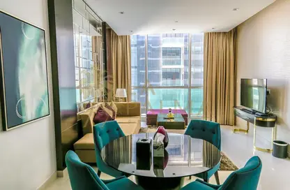 صورة لـ غرفة المعيشة / غرفة الطعام شقة - 2 غرف نوم - 3 حمامات للبيع في برج أبر كريست - دبي وسط المدينة - دبي ، صورة رقم 1