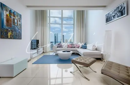 Living Room image for: Apartment - 1 Bedroom - 1 Bathroom for rent in Laguna Movenpick - Lake Allure - Jumeirah Lake Towers - Dubai, Image 1