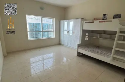 Apartment - 2 Bedrooms - 2 Bathrooms for sale in Orient Towers - Al Bustan - Ajman