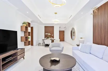 Living / Dining Room image for: Apartment - 1 Bedroom - 2 Bathrooms for rent in Dunya Tower - Burj Khalifa Area - Downtown Dubai - Dubai, Image 1