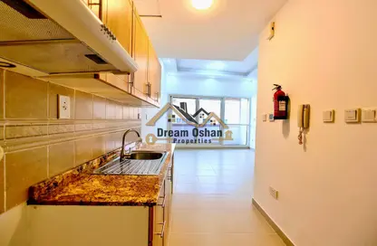 Apartment - Studio - 1 Bathroom for rent in ASB Tower - Dubai Silicon Oasis - Dubai