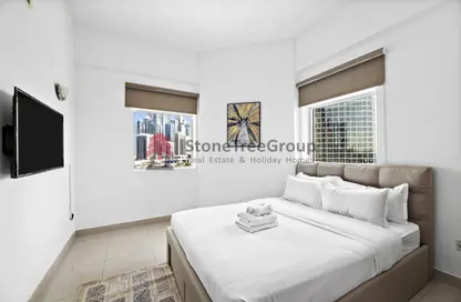 صورة لـ غرفة- غرفة النوم شقة - غرفة نوم - 1 حمام للايجار في بوابة دبي الجديدة 1 - بحيرة إلوشيو - أبراج بحيرة الجميرا - دبي ، صورة رقم 1