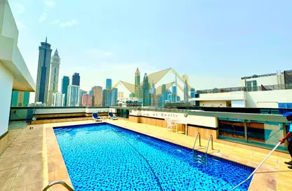 Apartment - 1 Bedroom - 2 Bathrooms for rent in Jumeirah Garden City - Al Satwa - Dubai