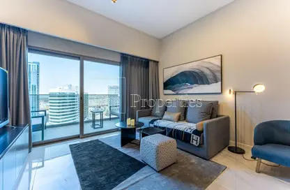 Living Room image for: Apartment - 2 Bedrooms - 2 Bathrooms for sale in MAG 318 - Business Bay - Dubai, Image 1