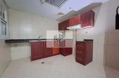 Kitchen image for: Apartment - 1 Bedroom - 1 Bathroom for rent in Al Nada Tower - Al Nahda - Sharjah, Image 1