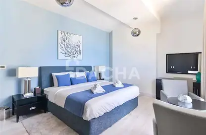 Room / Bedroom image for: Apartment - 3 Bedrooms - 4 Bathrooms for sale in Shams 1 - Shams - Jumeirah Beach Residence - Dubai, Image 1