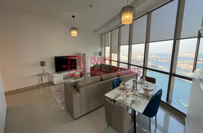 Living / Dining Room image for: Apartment - 1 Bedroom - 1 Bathroom for rent in Etihad Tower 4 - Etihad Towers - Corniche Road - Abu Dhabi, Image 1