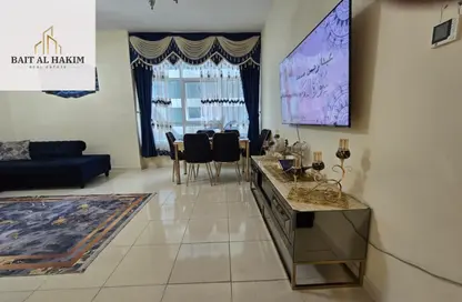 شقة - 2 غرف نوم - 2 حمامات للبيع في أورينت تاور 1 - أورينت تاور - البستان - عجمان