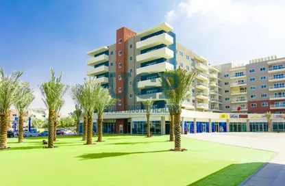 Outdoor Building image for: Apartment - 2 Bedrooms - 2 Bathrooms for sale in Tower 12 - Al Reef Downtown - Al Reef - Abu Dhabi, Image 1