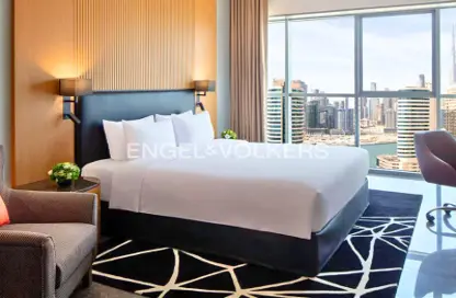 Room / Bedroom image for: Apartment - 1 Bathroom for sale in Sky Bay Hotel - Business Bay - Dubai, Image 1
