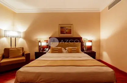 Room / Bedroom image for: Apartment - 1 Bedroom - 2 Bathrooms for sale in Grand Central Hotel - Barsha Heights (Tecom) - Dubai, Image 1