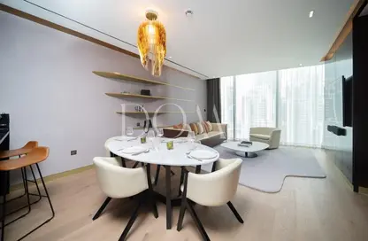 Living / Dining Room image for: Apartment - 1 Bedroom - 1 Bathroom for sale in The Opus - Business Bay - Dubai, Image 1