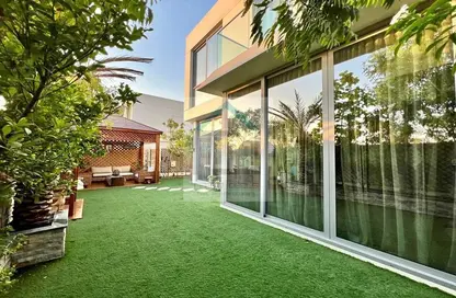 Garden image for: Townhouse - 4 Bedrooms - 5 Bathrooms for rent in Gardenia Townhomes - Wasl Gate - Dubai, Image 1