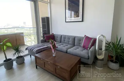 Living Room image for: Apartment - 1 Bedroom - 2 Bathrooms for rent in Hameni Tower - Jumeirah Village Circle - Dubai, Image 1